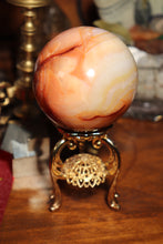 Load image into Gallery viewer, Custard Yellow & Peach Carnelian Sphere with Quartz