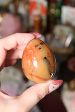 Load image into Gallery viewer, Funky Carnelian Egg with Dark Inclusions