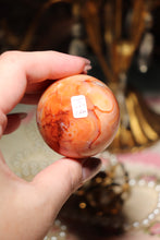 Load image into Gallery viewer, Banded Peachy Quartz Carnelian Sphere