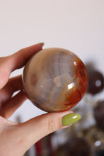Load image into Gallery viewer, Cool-Toned Blue &amp; Orange Carnelian Sphere