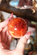 Load image into Gallery viewer, “Tie Dye” Carnelian Sphere with Blue