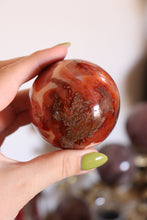 Load image into Gallery viewer, Mossy Strawberry Carnelian Sphere
