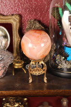 Load image into Gallery viewer, Peachy Carnelian Sphere with Natural Cave