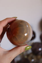 Load image into Gallery viewer, Cool-Toned Blue &amp; Orange Carnelian Sphere