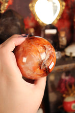 Load image into Gallery viewer, Peachy Carnelian Sphere with Natural Cave